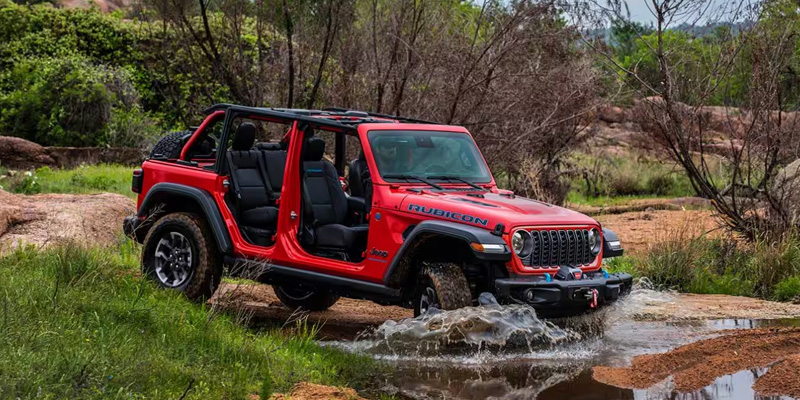 Jeep Wrangler Rubicon Off-Roading Through Water
